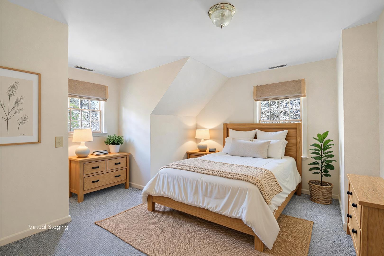 2 Cosmos Way Edgartown, MA 02539 - Photo 20 of 29 a bedroom with a bed and a baby crib