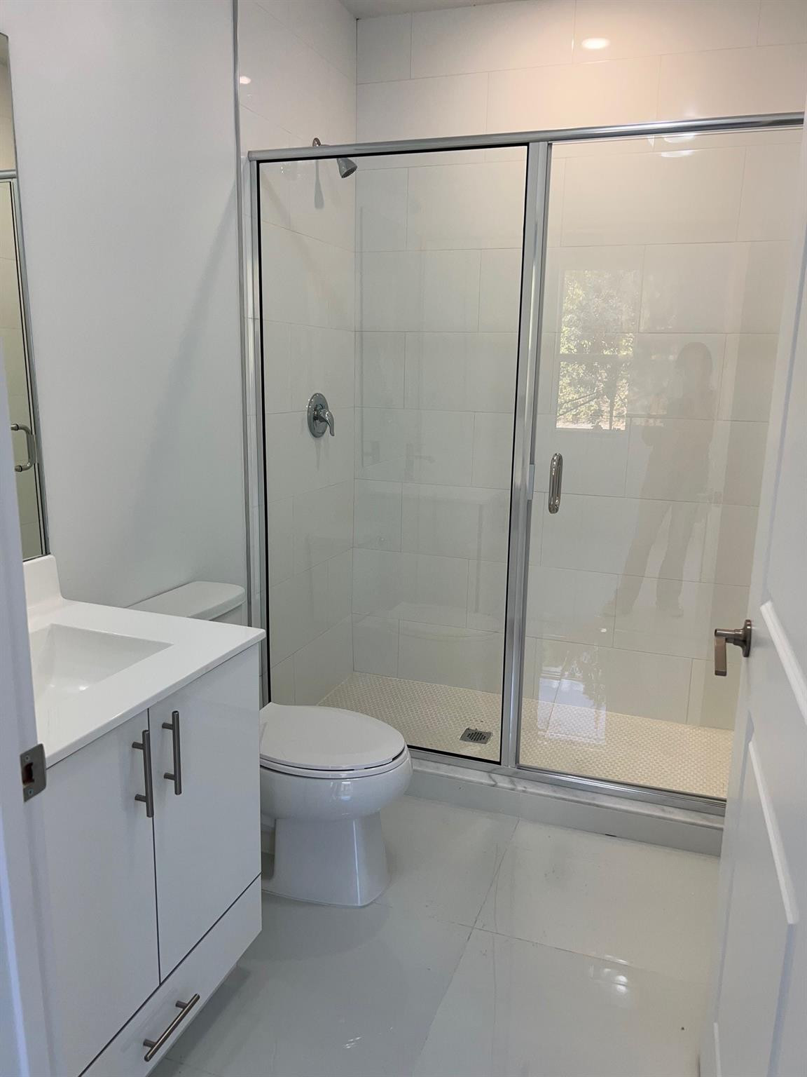 24650 Southwest 129th Avenue Homestead, FL 33032 - Photo 10 of 15 a bathroom with a shower a toilet and sink