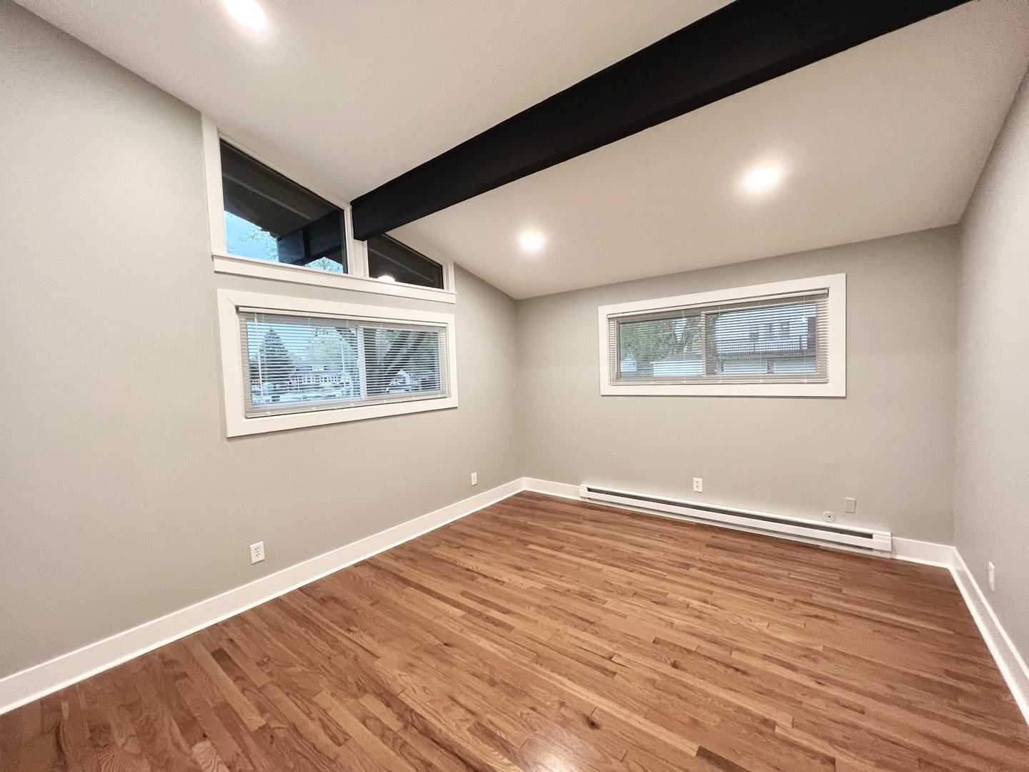 515 South Street Lockport, IL 60441 - Photo 15 of 22 a view of an empty room with wooden floor and a window
