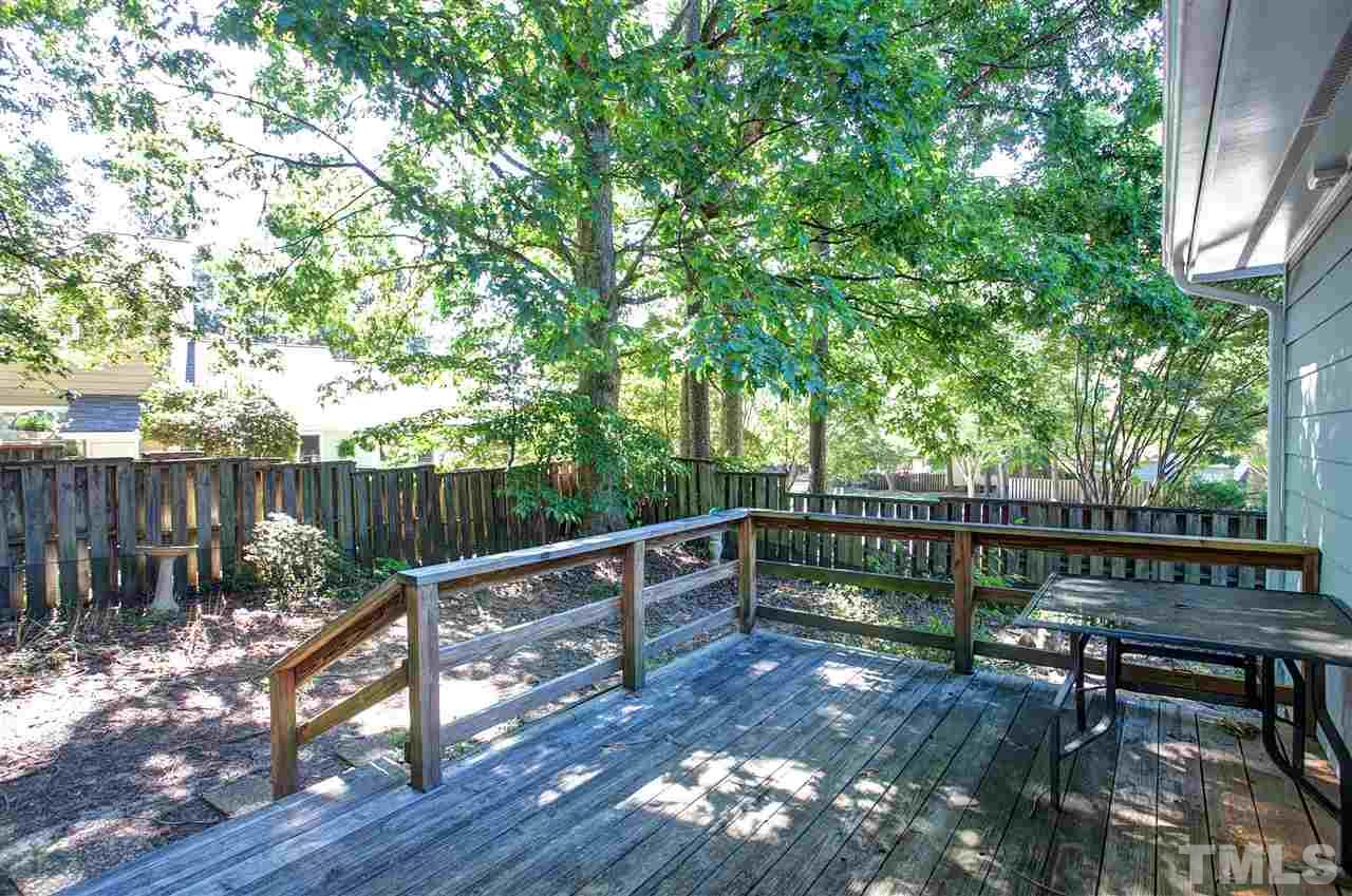 1500 Ferncliff Circle Raleigh, NC 27609 - Photo 20 of 25 a view of a deck with furniture and trees around