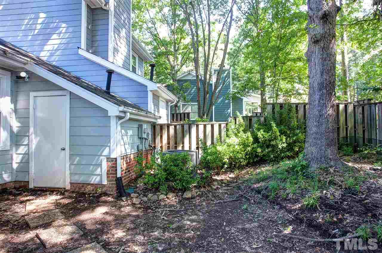 1500 Ferncliff Circle Raleigh, NC 27609 - Photo 21 of 25 a view of a house with a yard