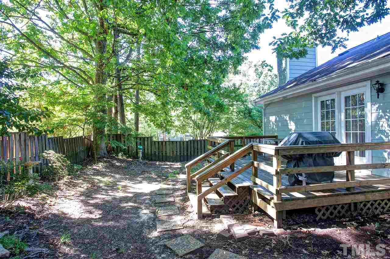 1500 Ferncliff Circle Raleigh, NC 27609 - Photo 22 of 25 a view of a house with backyard and sitting area