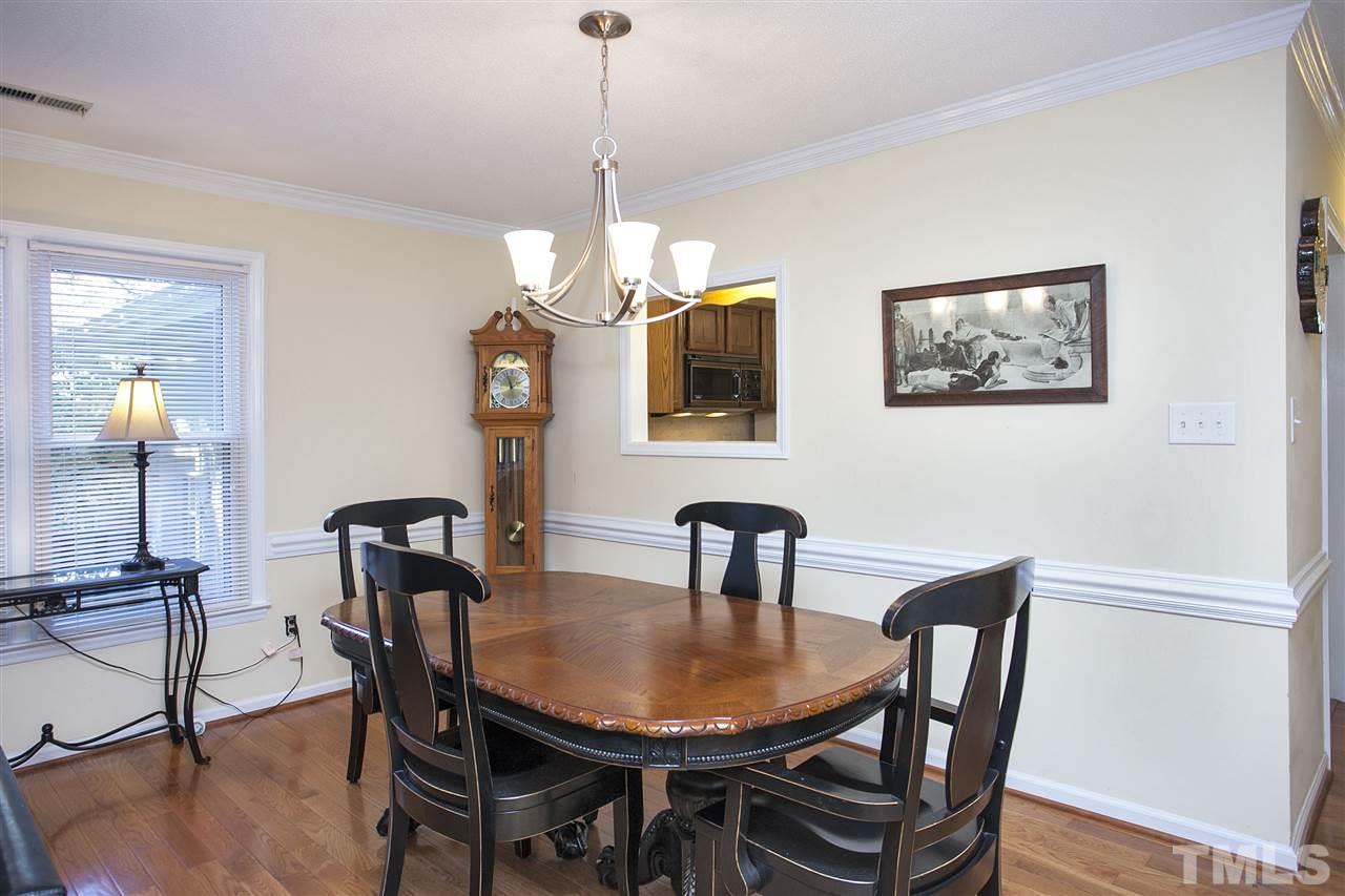 1500 Ferncliff Circle Raleigh, NC 27609 - Photo 7 of 25 a view of a dining room with furniture and wooden floor