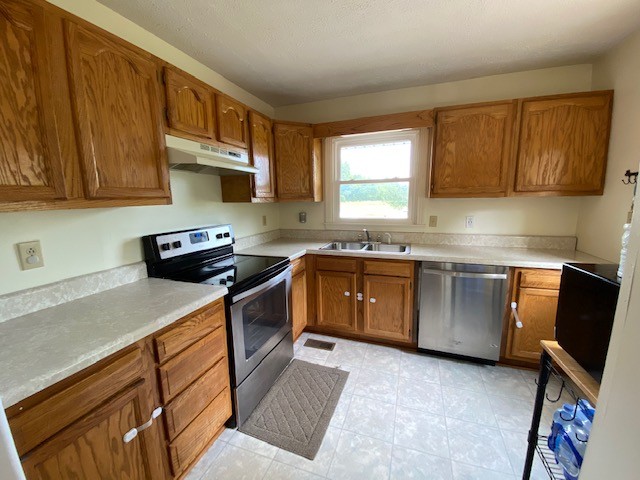 3764 Decherd Estill Road Winchester, TN 37398 - Photo 4 of 29 a kitchen with a sink a stove cabinets and a window