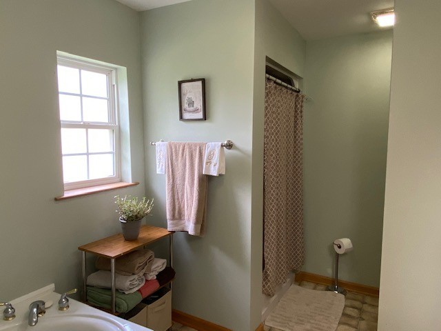 3764 Decherd Estill Road Winchester, TN 37398 - Photo 10 of 29 a bathroom with a sink toilet and shower