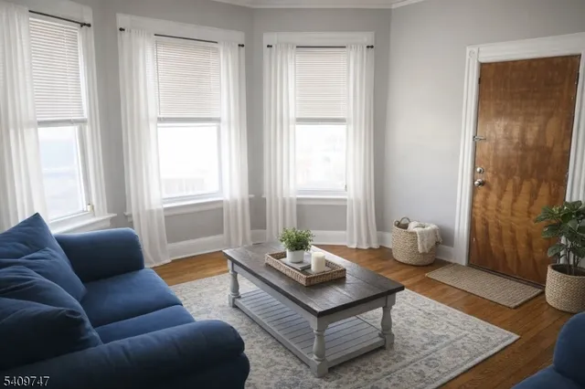 a living room with furniture and window