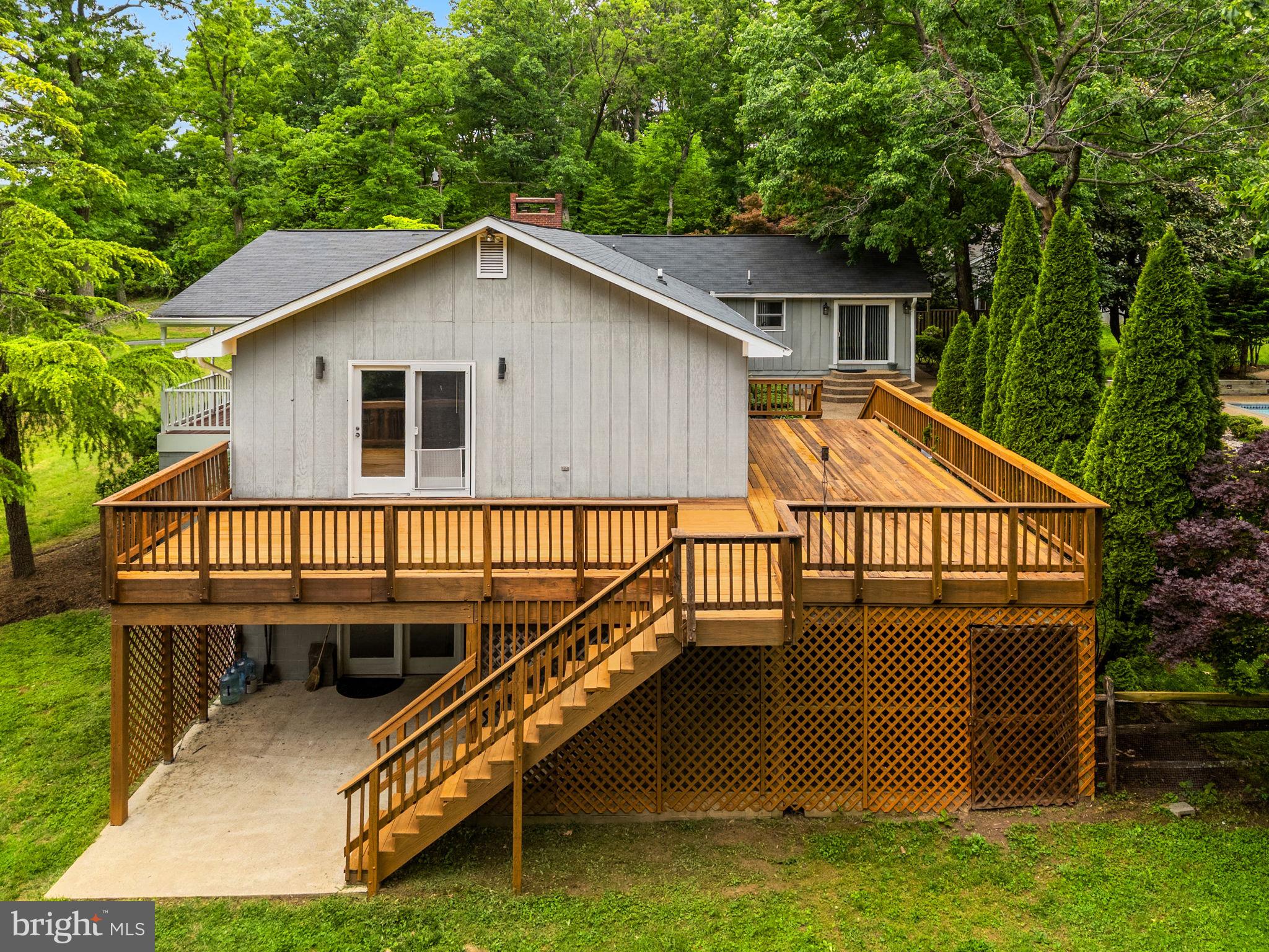 41726 Stumptown Road Leesburg, VA 20176 - Photo 68 of 91 Side View with Wraparound Deck and Stairs to Yard