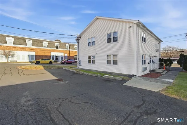 a view of a street with cars