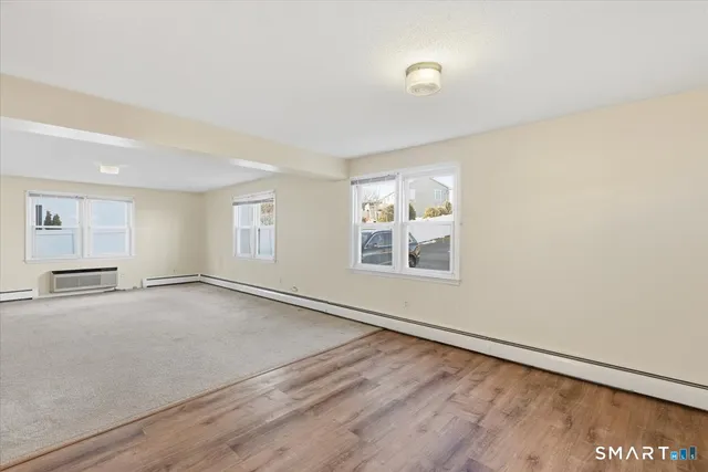 an empty room with windows