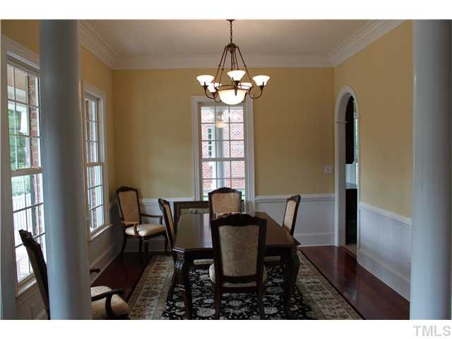 2108 Tulare Court Raleigh, NC 27612 - Photo 3 of 25 Wanes coating hardwoods chair rail 3 piece crown. Dining Room