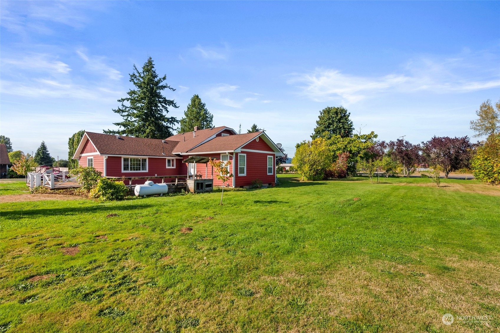 10441 Independence Road Southwest Rochester, WA 98579 - Photo 27 of 33 a front view of a house with garden