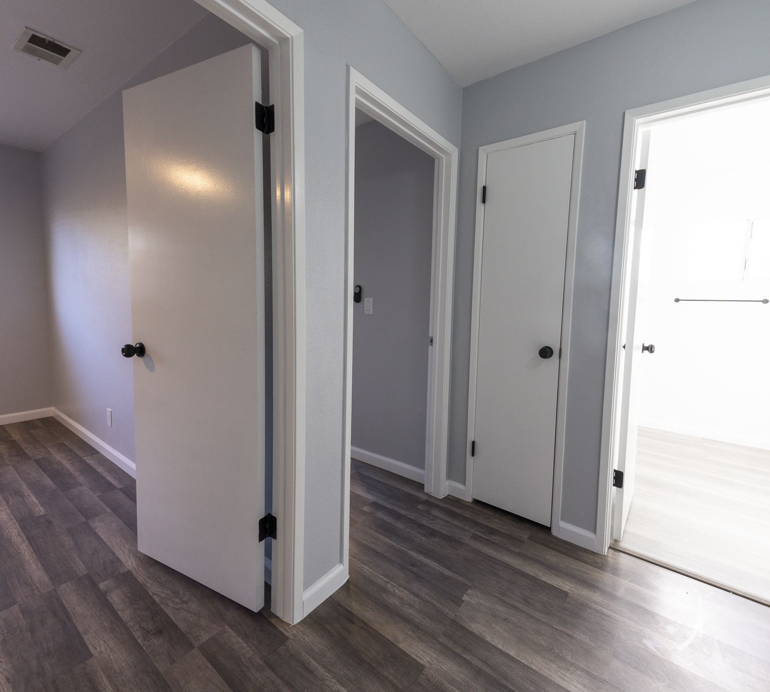 413 South Lincoln Street Ridgecrest, CA 93555 - Photo 8 of 34 a view of hallway with wooden floor