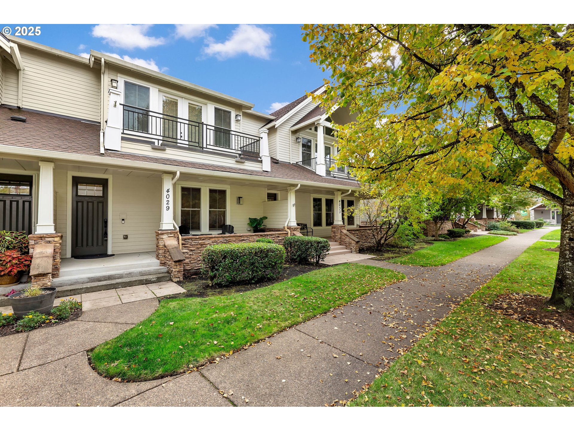 4029 Northwest 77th Avenue Camas, WA 98607 - Photo 1 of 33 a front view of a house with a yard and potted plants