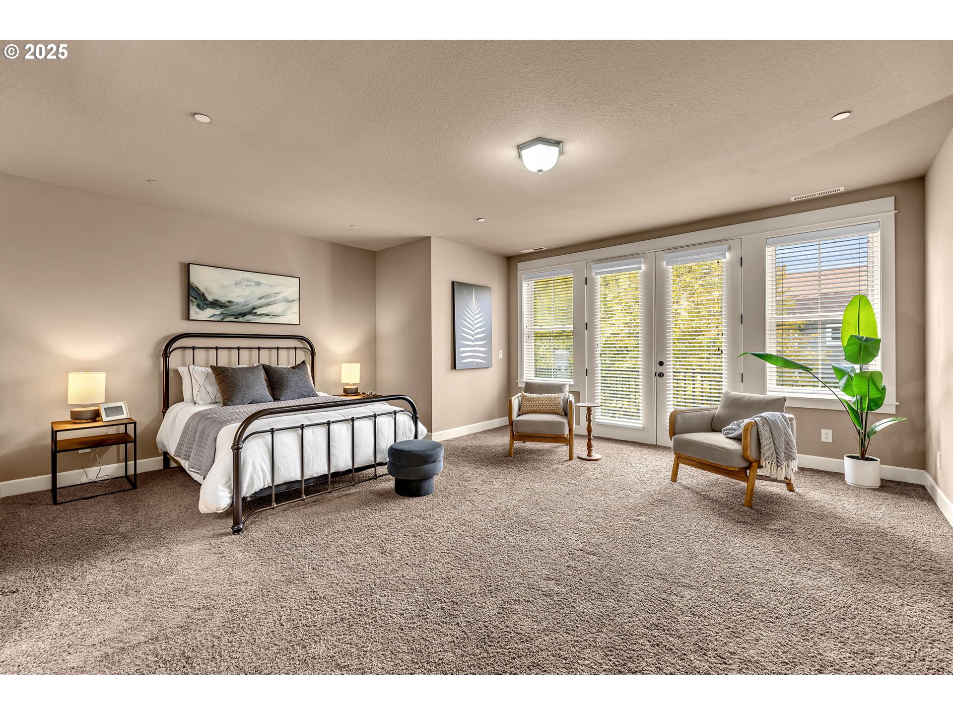 4029 Northwest 77th Avenue Camas, WA 98607 - Photo 15 of 33 a spacious bedroom with a bed and a couch