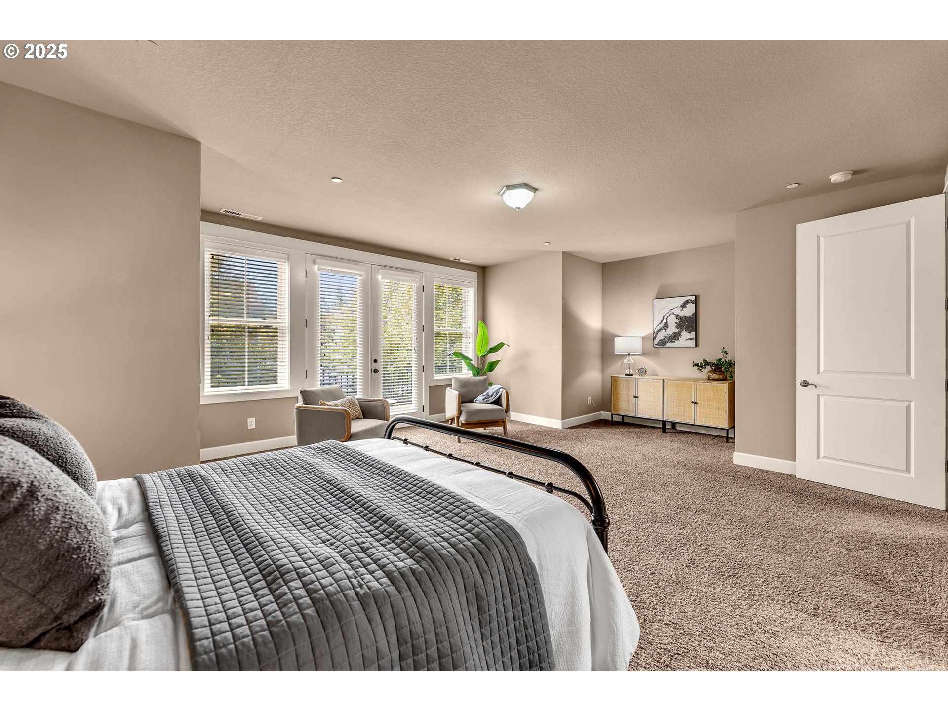 4029 Northwest 77th Avenue Camas, WA 98607 - Photo 16 of 33 a bedroom with a bed and a large mirror