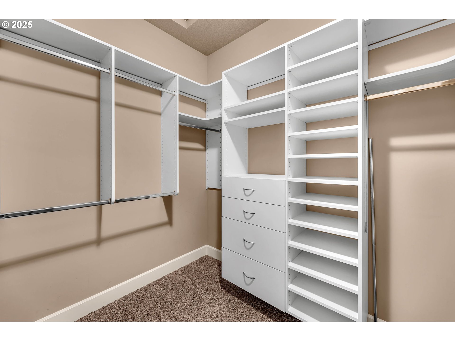 4029 Northwest 77th Avenue Camas, WA 98607 - Photo 22 of 33 a view of walk in closet with empty racks