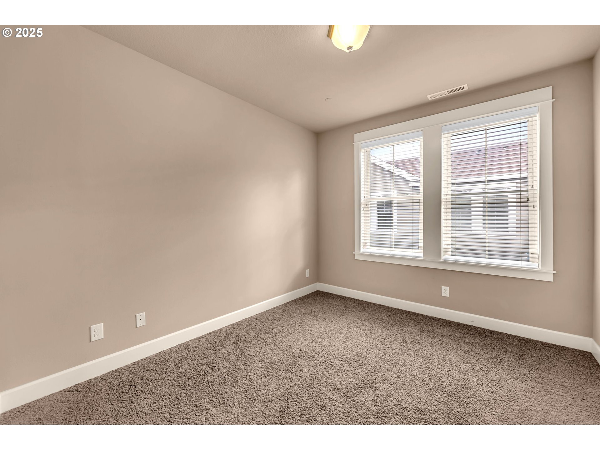 4029 Northwest 77th Avenue Camas, WA 98607 - Photo 27 of 33 a view of an empty room with a window