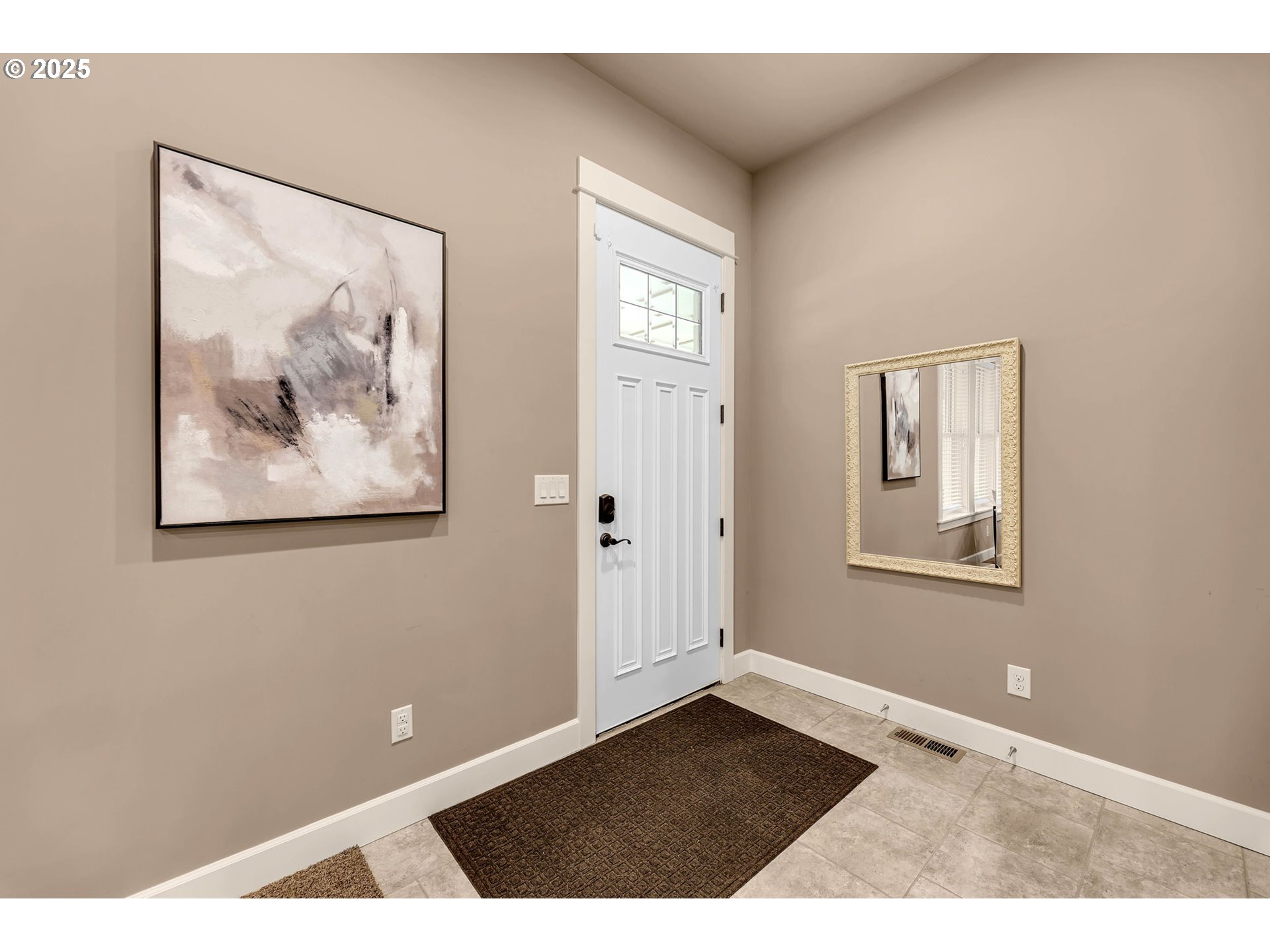 4029 Northwest 77th Avenue Camas, WA 98607 - Photo 3 of 33 a view of an empty room with window and wooden floor