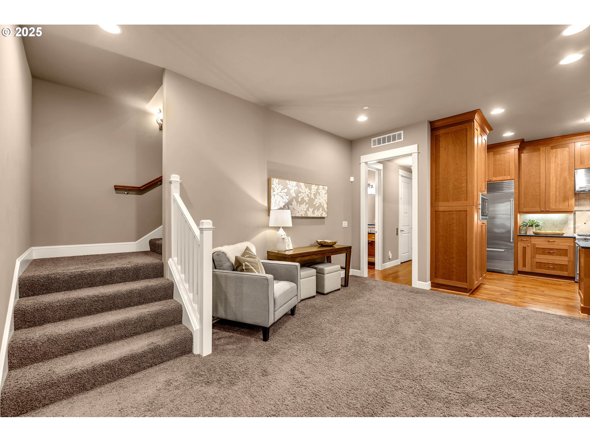 4029 Northwest 77th Avenue Camas, WA 98607 - Photo 6 of 33 a living room with furniture and a kitchen