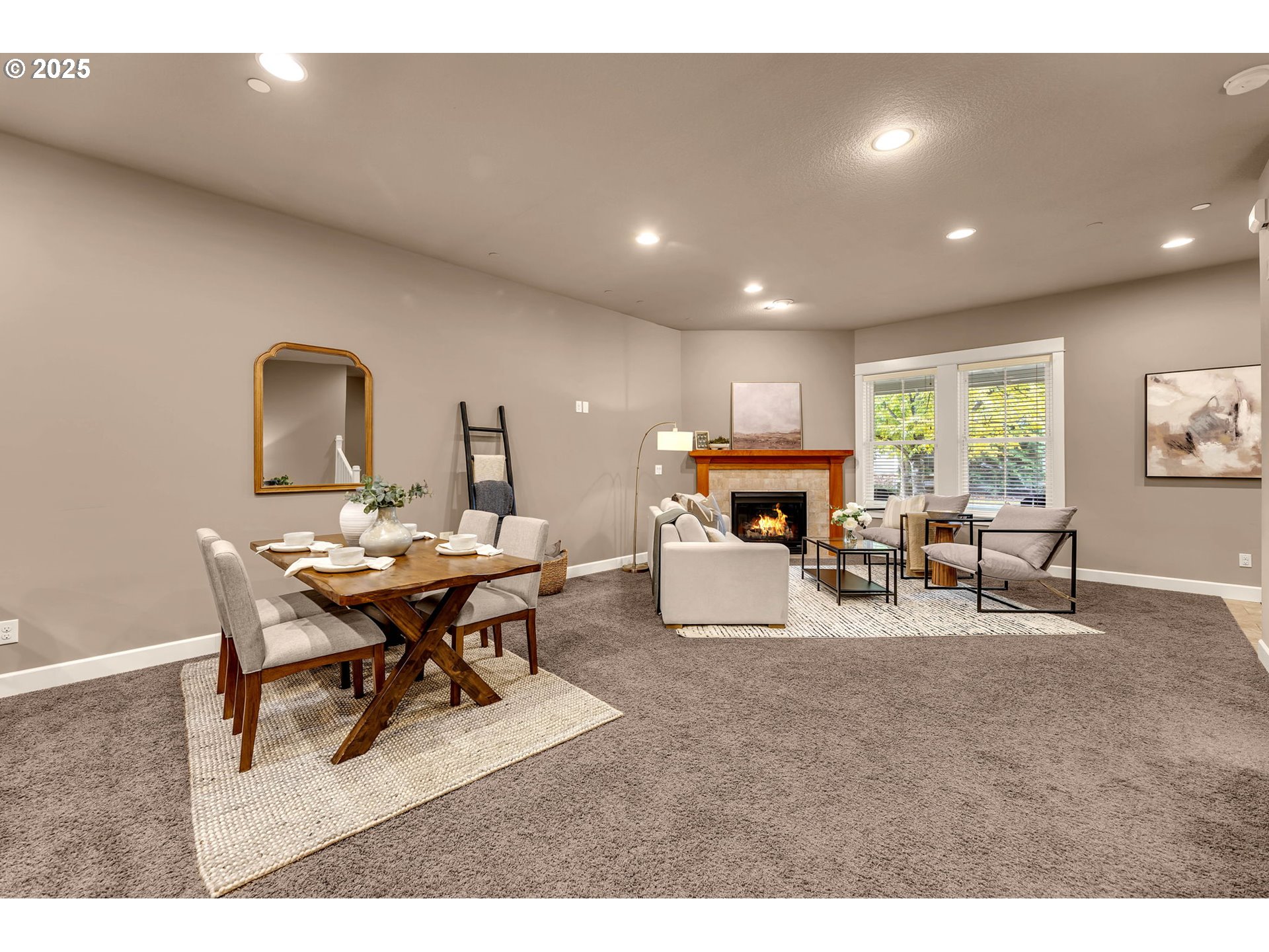 4029 Northwest 77th Avenue Camas, WA 98607 - Photo 8 of 33 a living room with furniture a fireplace and a large window