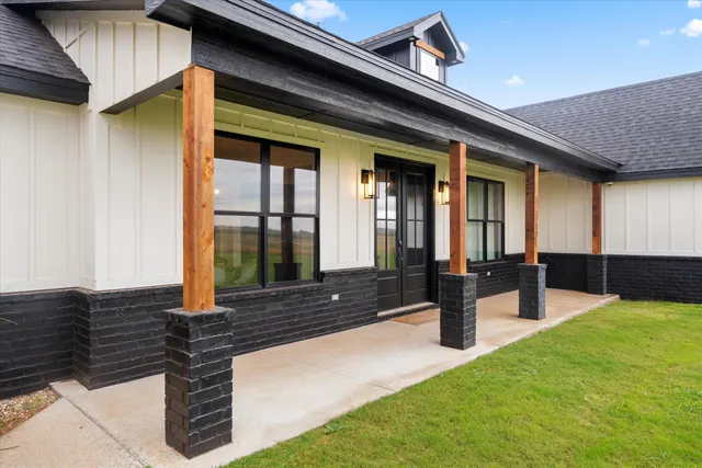 a view of swimming pool with patio