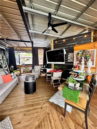a outdoor space with lots of furniture and plants