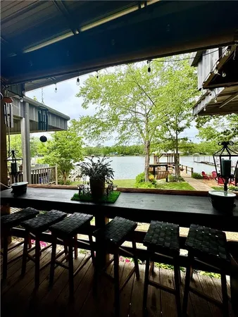 a view of a dining room with furniture and window