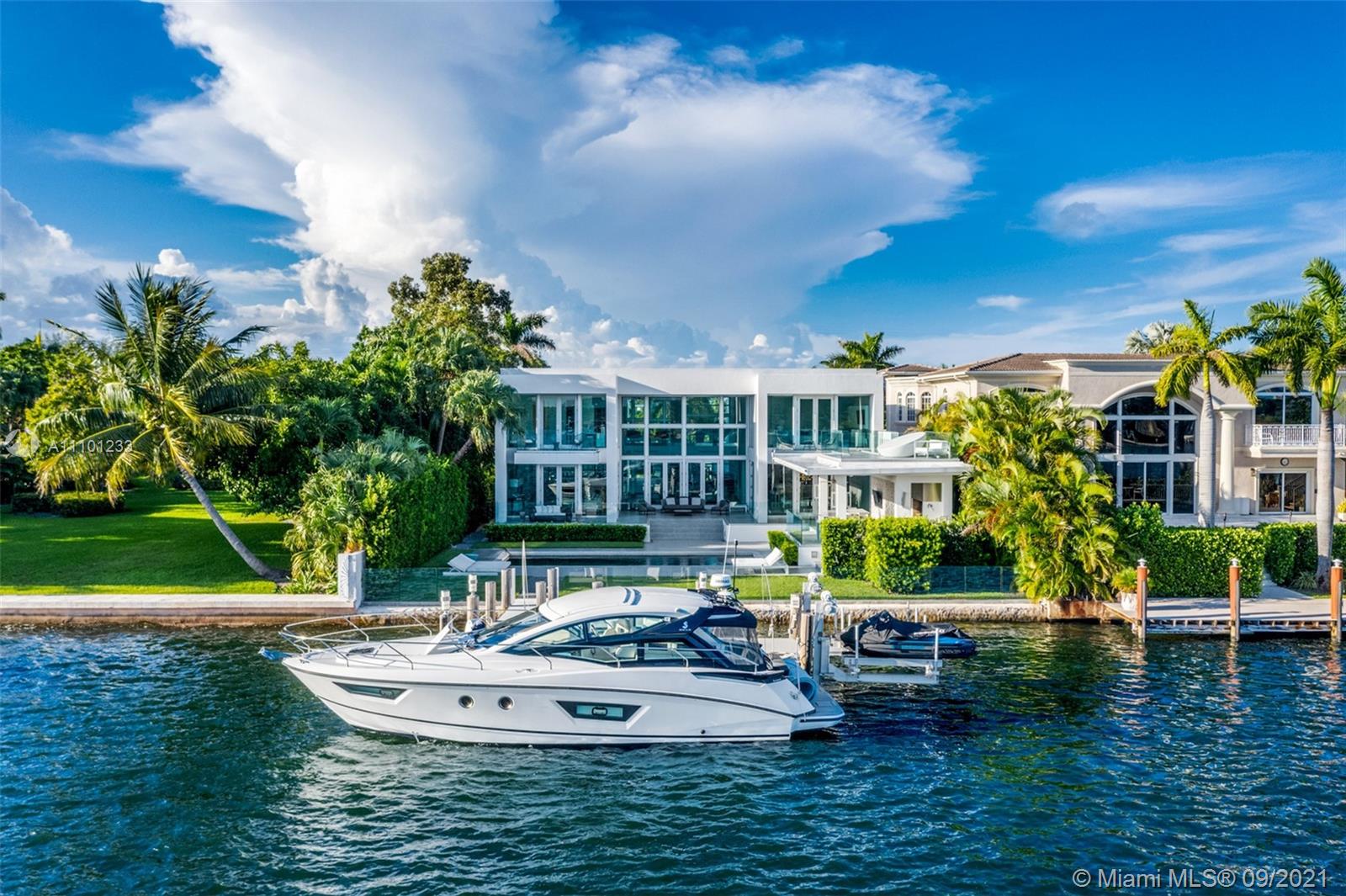 1236 Biscaya Drive Surfside, FL 33154 - Photo 37 of 40 a view of a house with a yard balcony and sitting area