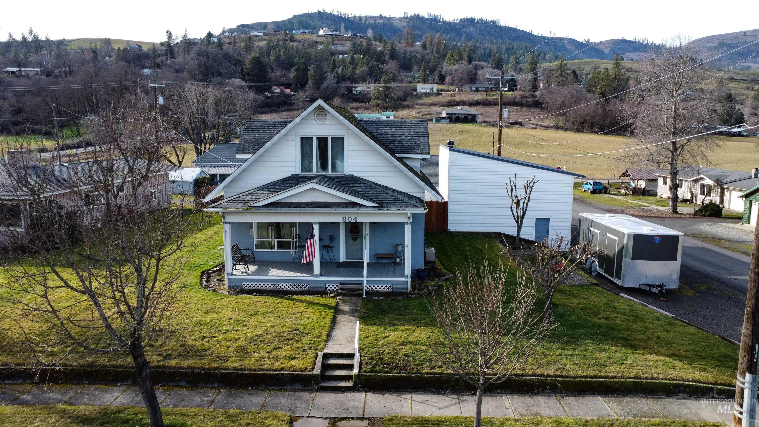 804 Maple Street Kamiah, ID 83536 - Photo 1 of 50 Traditional architecture featuring a covered porch, gabled roofline, and dormer window