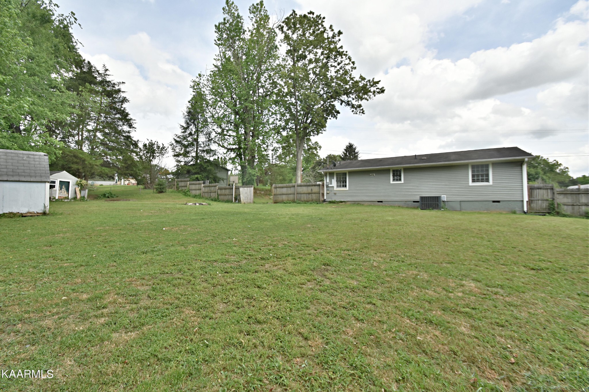 7715 Nicholas Drive Corryton, TN 37721 - Photo 16 of 16 a view of a house with a big yard