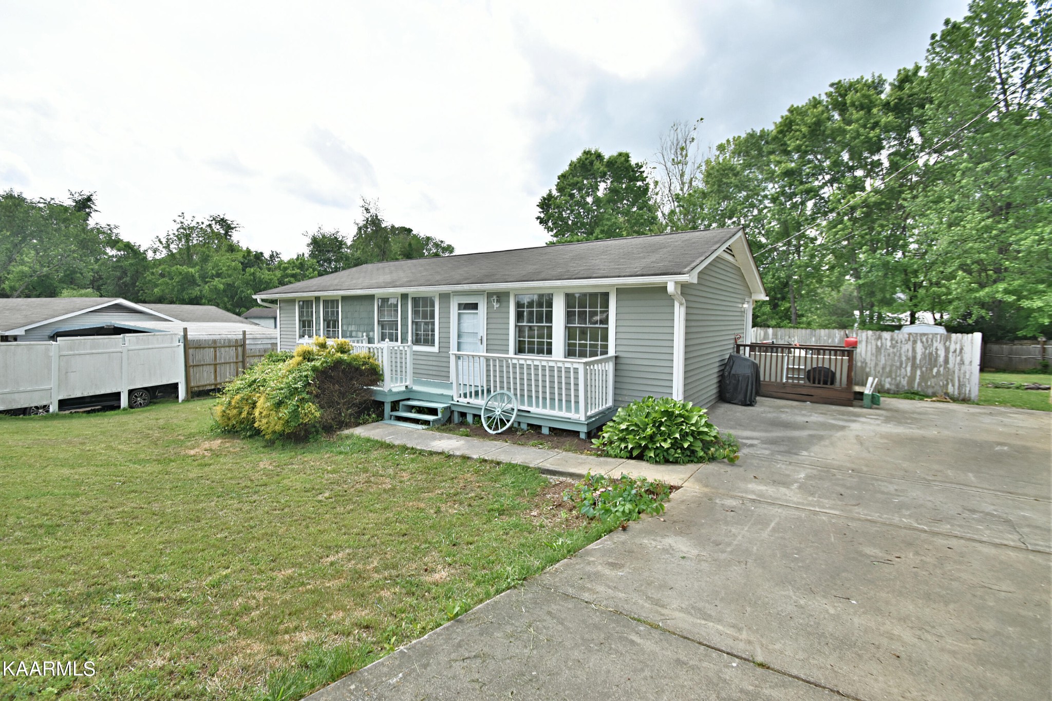 7715 Nicholas Drive Corryton, TN 37721 - Photo 3 of 16 a view of a house with backyard and sitting area