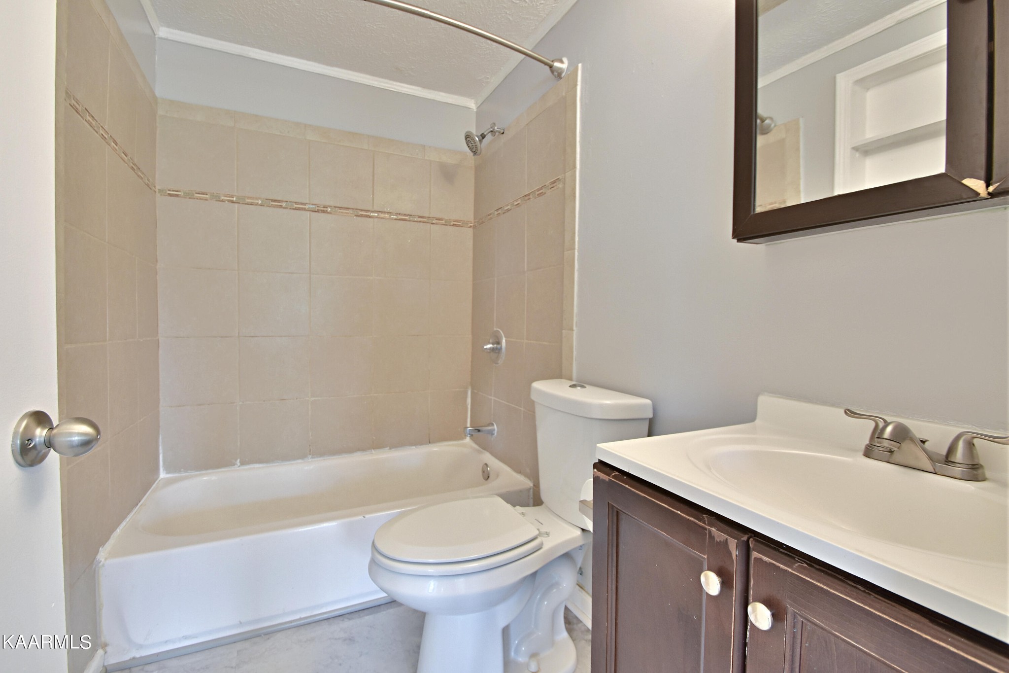 7715 Nicholas Drive Corryton, TN 37721 - Photo 9 of 16 a bathroom with a sink a toilet and shower