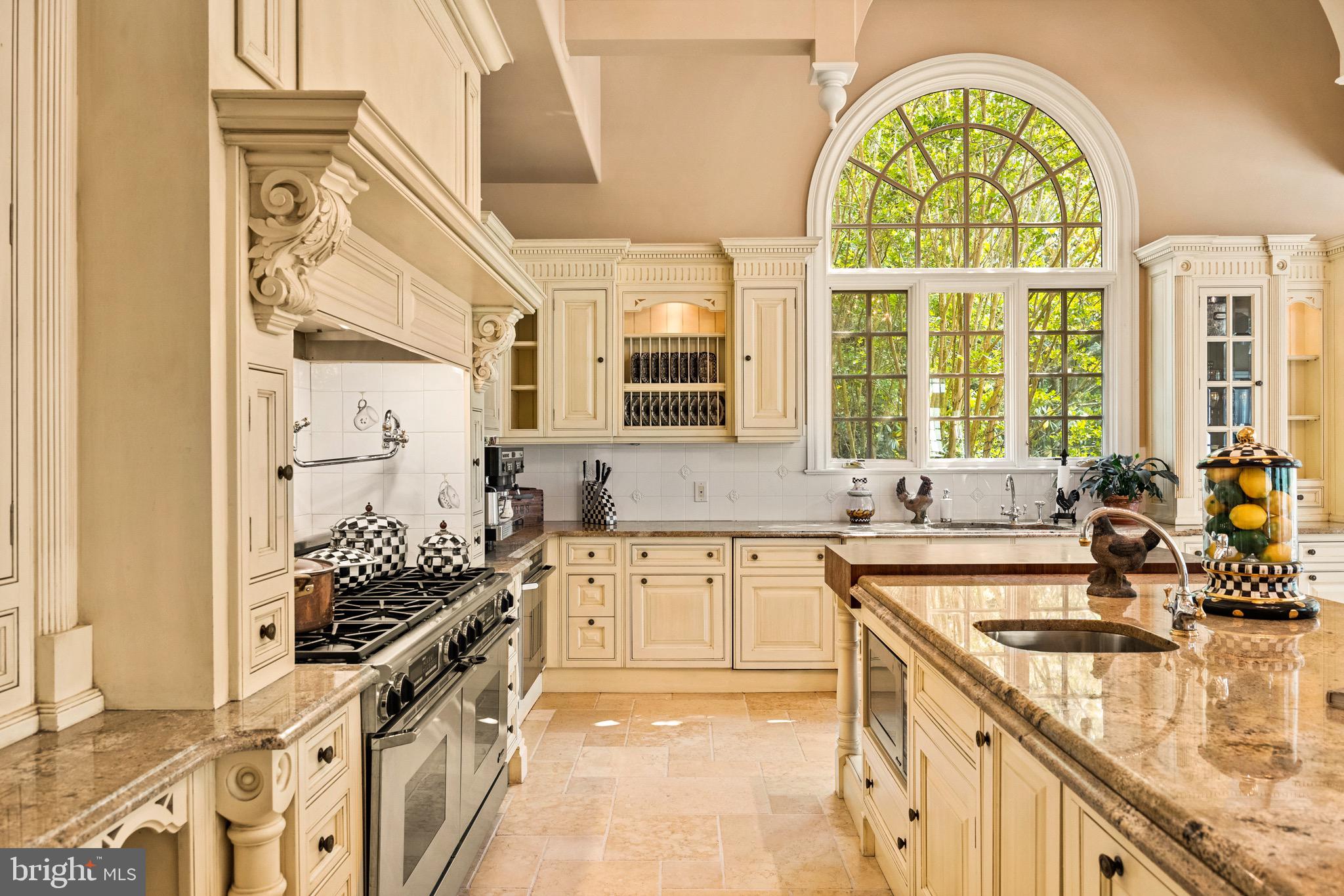 343 Bridgeboro Road Moorestown, NJ 08057 - Photo 13 of 52 a kitchen with stainless steel appliances a sink a stove and a window