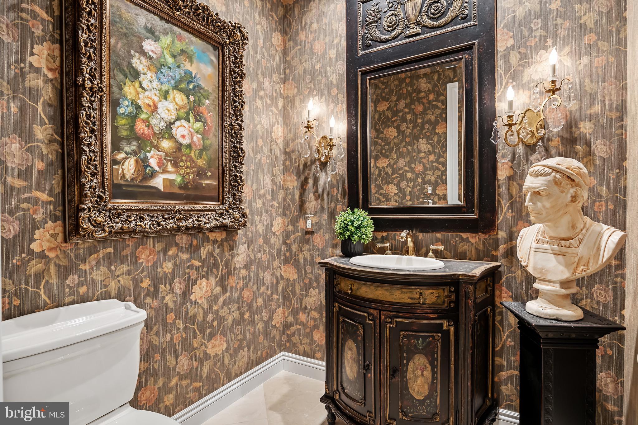 343 Bridgeboro Road Moorestown, NJ 08057 - Photo 19 of 52 a bathroom with a sink a toilet and shower curtain