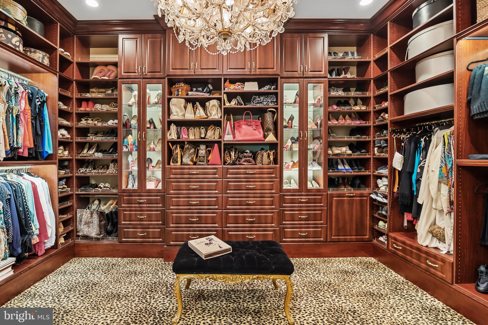 343 Bridgeboro Road Moorestown, NJ 08057 - Photo 24 of 52 a view of walk in closet with clothes and shoes