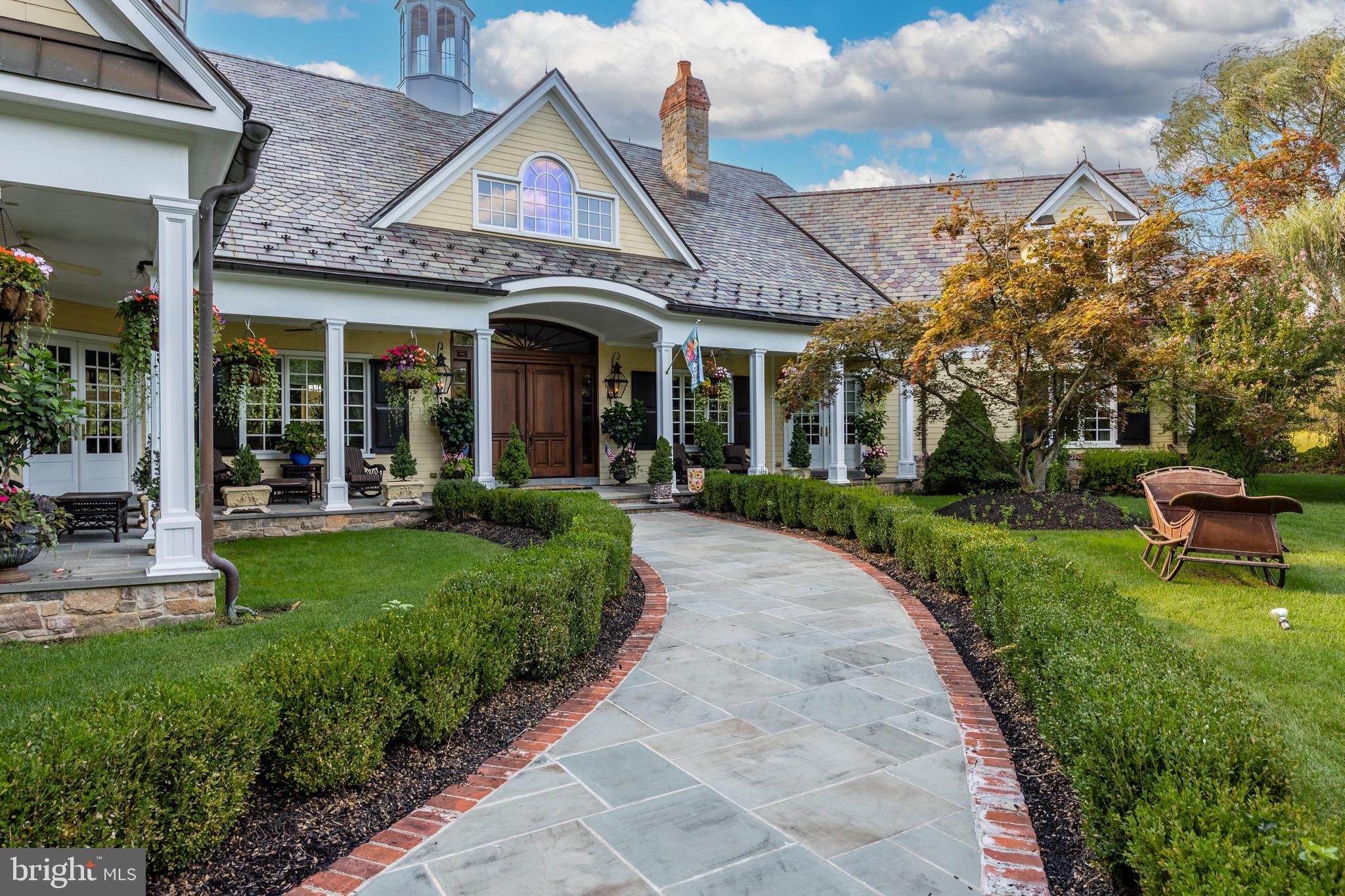 343 Bridgeboro Road Moorestown, NJ 08057 - Photo 8 of 52 a view of a house with garden and porch