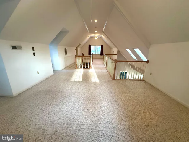 a view of a hallway with windows