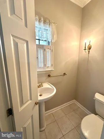 a view of an outdoor space and tennis court