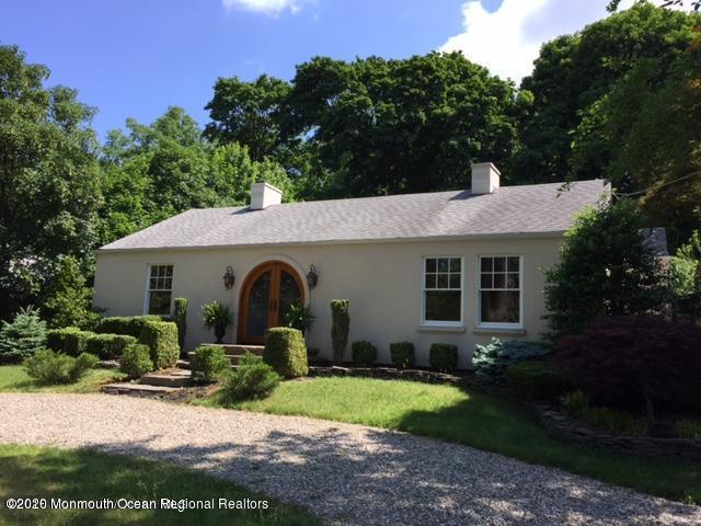 431 Spring Street Little Silver, NJ 07739 - Photo 1 of 15 a front view of house with yard and green space