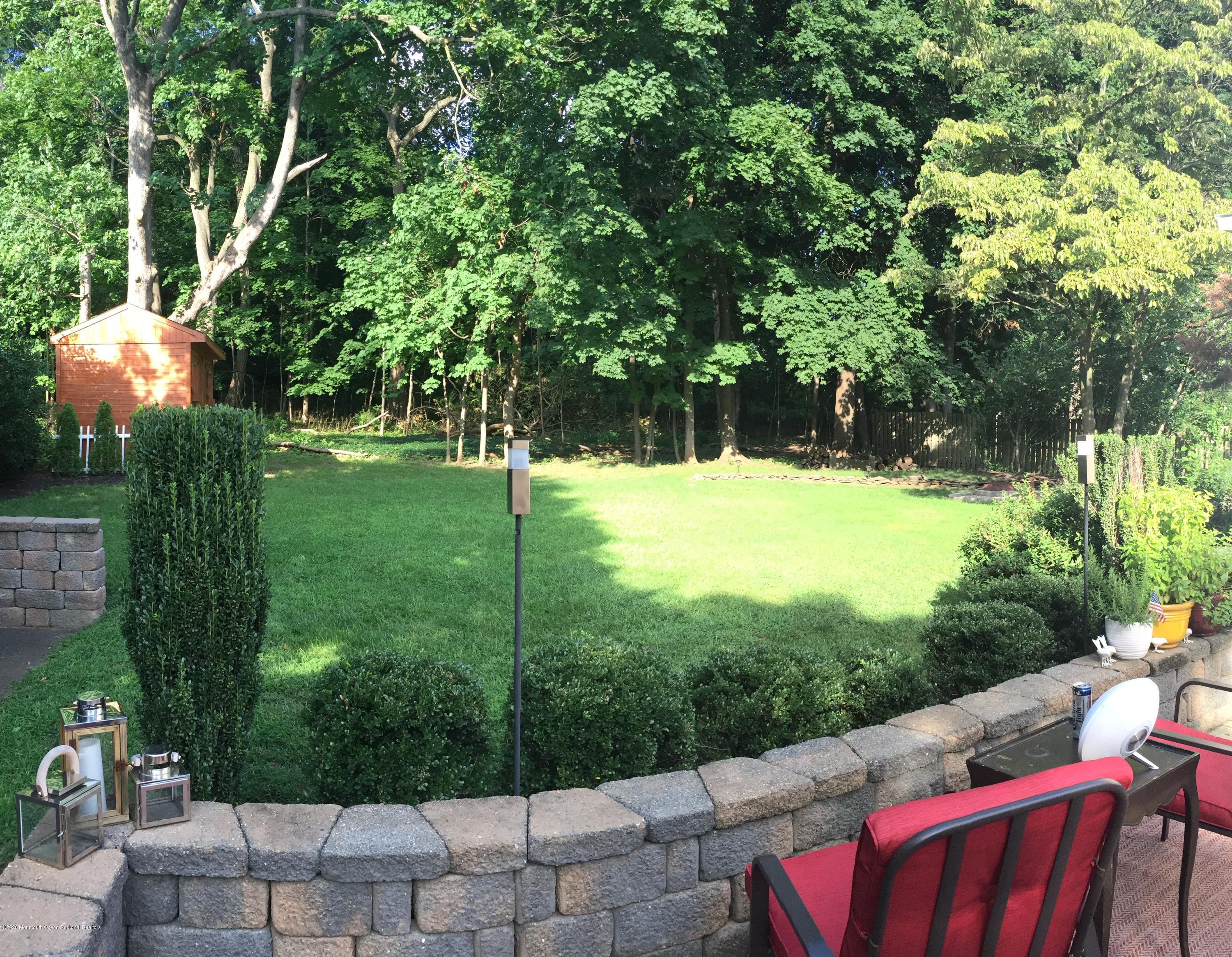 431 Spring Street Little Silver, NJ 07739 - Photo 13 of 15 a view of a yard with a patio