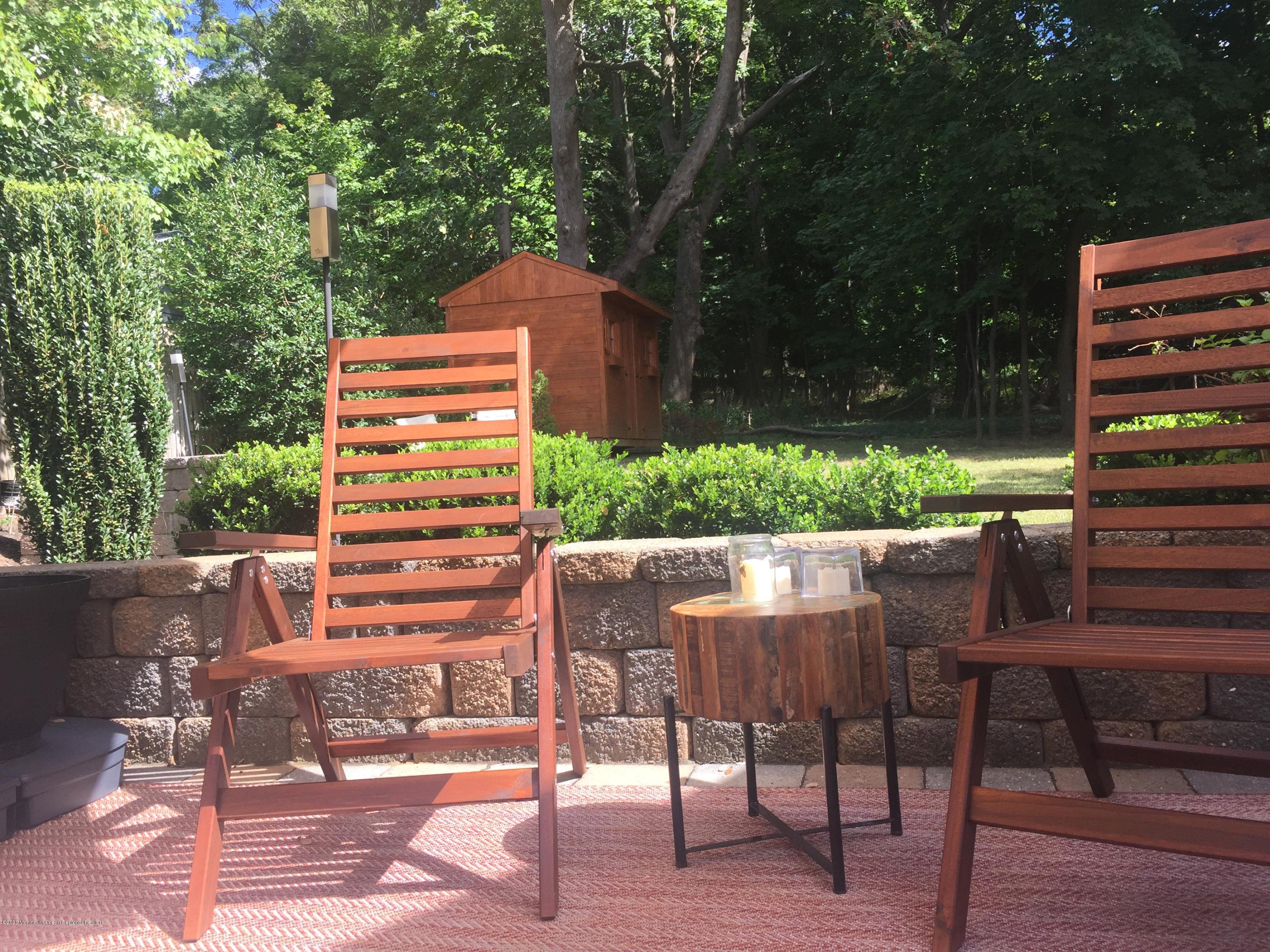 431 Spring Street Little Silver, NJ 07739 - Photo 14 of 15 a view of a chairs and table in the patio