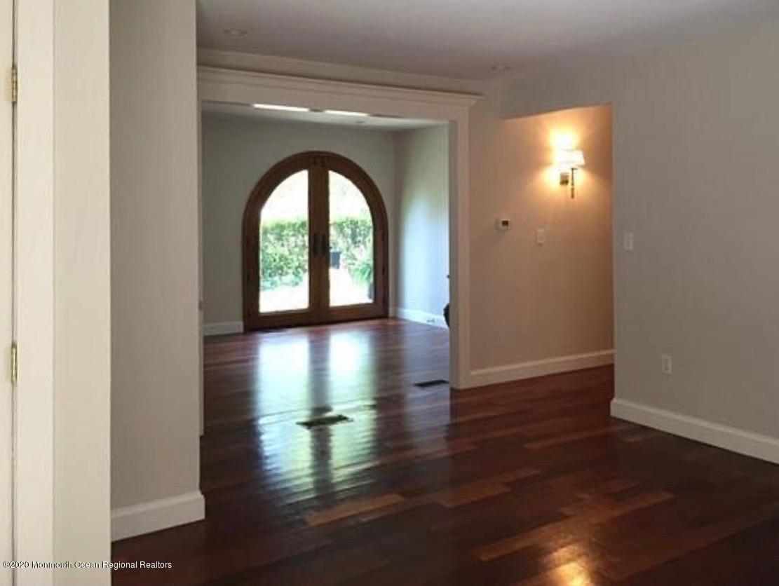 431 Spring Street Little Silver, NJ 07739 - Photo 7 of 15 a view of empty room with wooden floor and fan