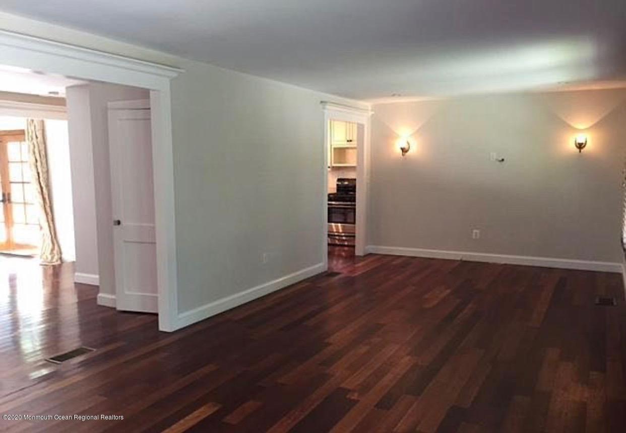 431 Spring Street Little Silver, NJ 07739 - Photo 8 of 15 wooden floor in an empty room with a window