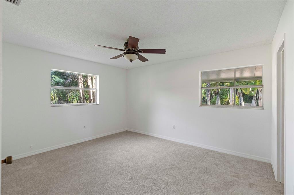 16900 Southwest 62nd Street Southwest Ranches, FL 33331 - Photo 28 of 48 a view of empty room with window