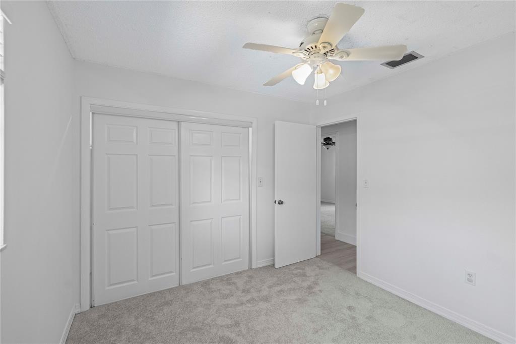 16900 Southwest 62nd Street Southwest Ranches, FL 33331 - Photo 41 of 48 a view of an empty room with a chandelier fan