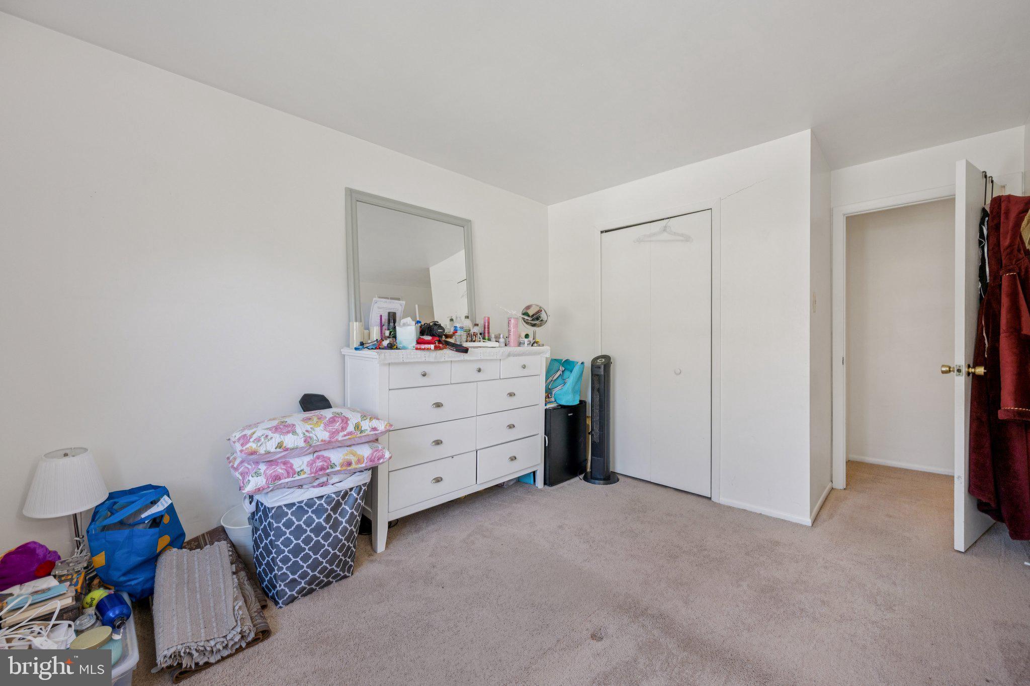 10522 East Wind Way Columbia, MD 21044 - Photo 13 of 21 a bedroom with a bed and closet