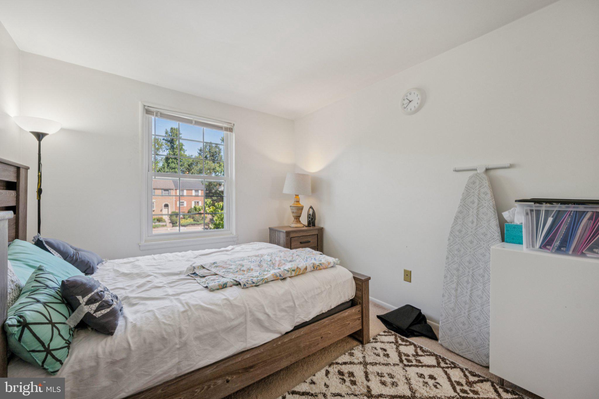 10522 East Wind Way Columbia, MD 21044 - Photo 14 of 21 a bedroom with a bed and a window in it