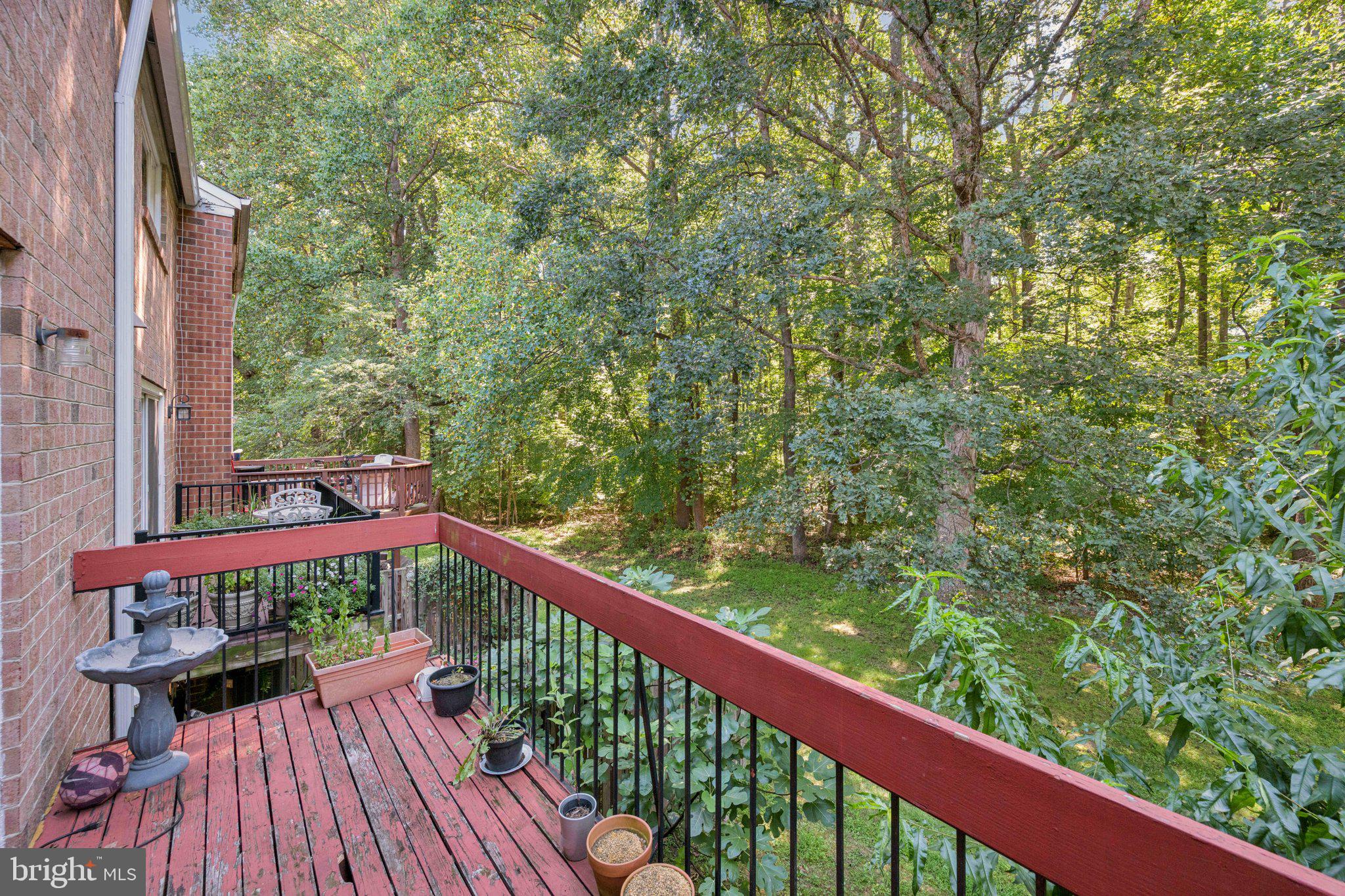 10522 East Wind Way Columbia, MD 21044 - Photo 18 of 21 a view of a balcony with wooden floor