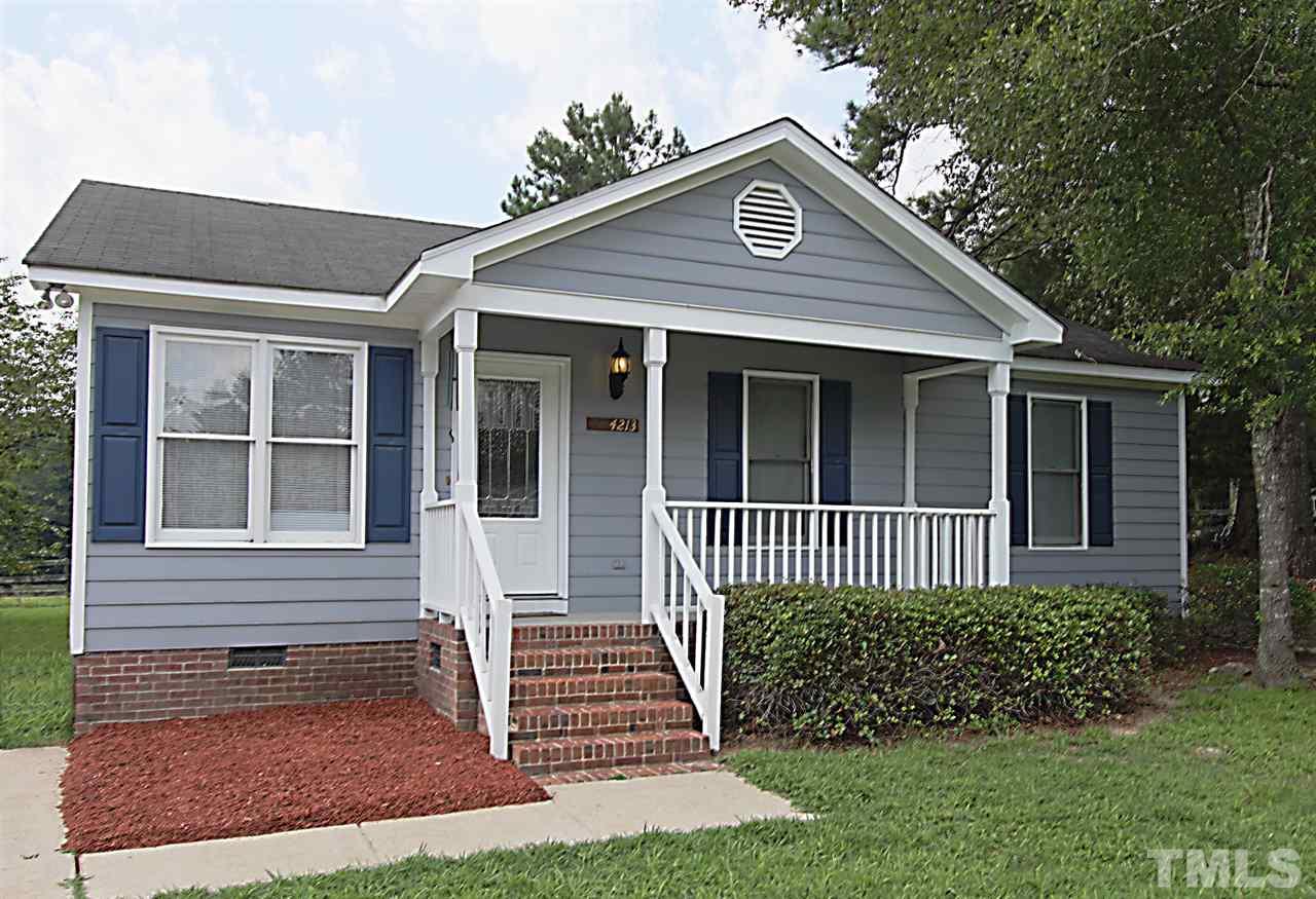 4213 Bluewing Road Raleigh, NC 27616 - Photo 1 of 16 front view of a house