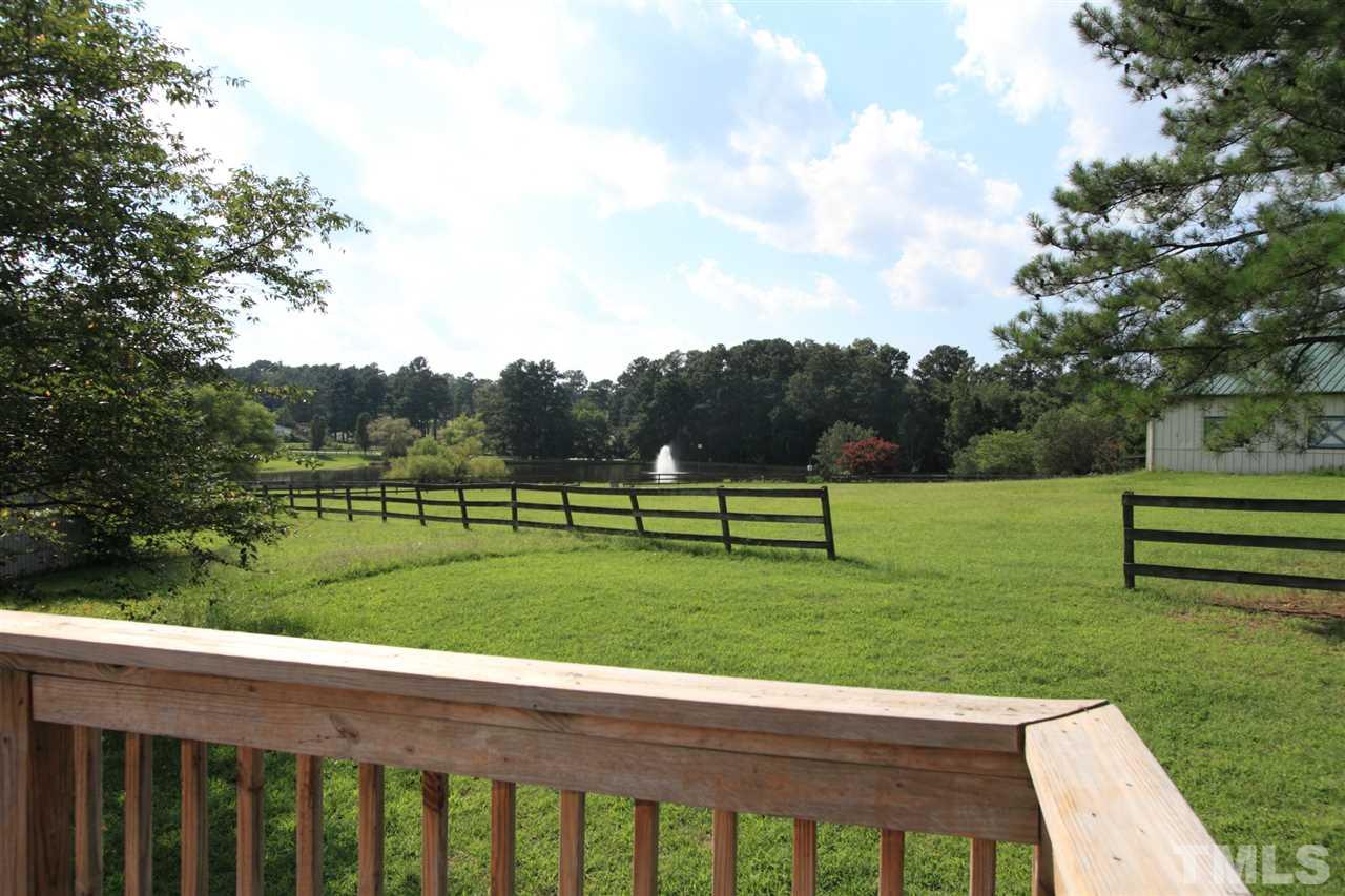4213 Bluewing Road Raleigh, NC 27616 - Photo 15 of 16 a view of a bench in a park